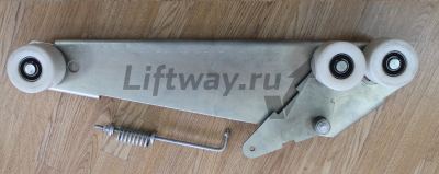 Каретка прижимного ремня поручня правая эск. Schindler 9300